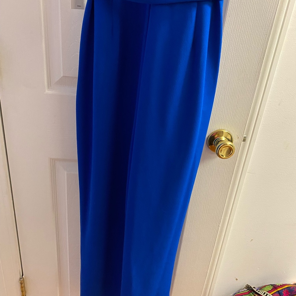 Calvin Klein Jump suit with gold zipper on the back blue belt size 8.